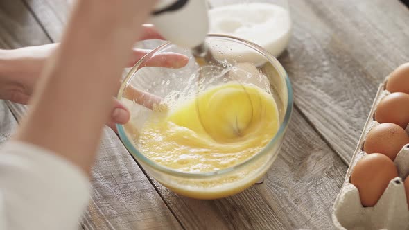 Whisk The Chicken Eggs In Glass Baking Bowl. Beat The Egg White And Jelly With A Whisk In An Egg