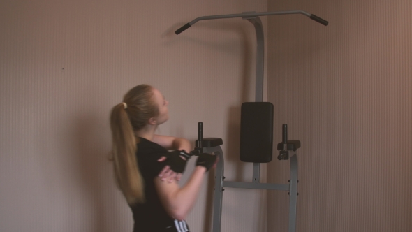 Girl Jumping On The Horizontal Bar