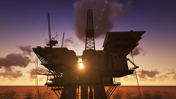 Oil Rig Silhouette In Ocean Beautiful Sunset