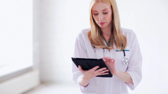 Female Doctor With Tablet Pc 55
