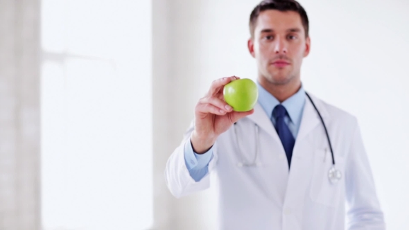 Doctor Showing Green Apple 48