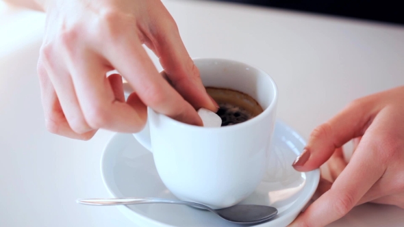 Woman Hands Adding Sugar To Coffee Cup 12