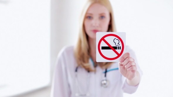 Doctor Showing No Smoking Sign 56