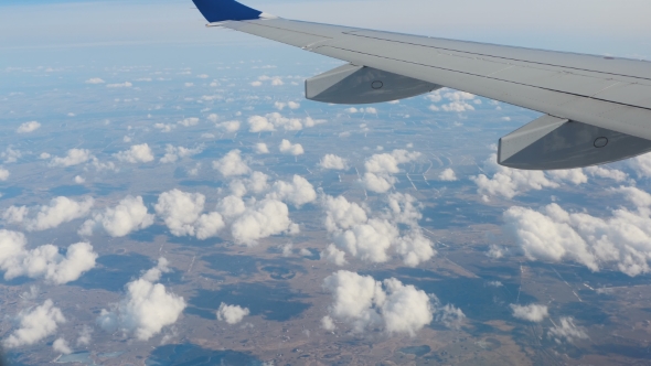 Clouds Under The Wing Of An Airplane
