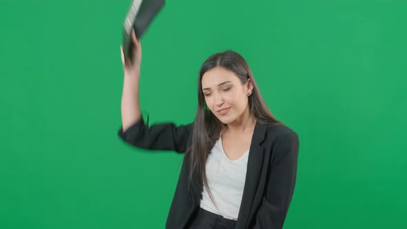 Happy Successful Businesswoman with Documents Is Dancing on Chromakey Green Screen Background