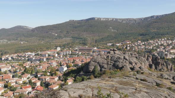 Small  settlement in Western Bulgaria slow pan 4K 2160p 30fps UltraHD footage - Town of Belogradchik