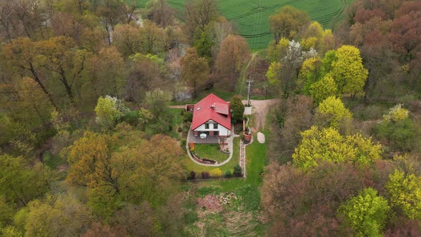 Aerial View of Alone House in Nature