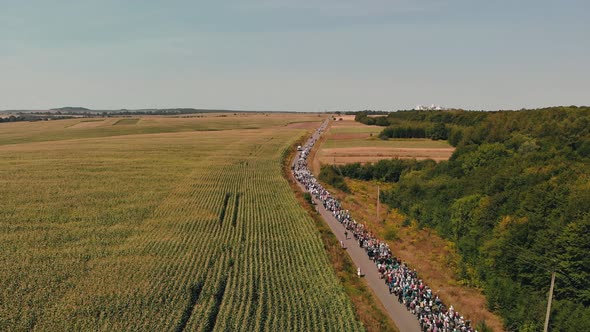 Orthodox Christians go on a religious procession.  alt