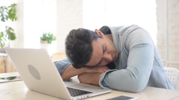 Sleeping Man on Desk