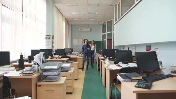 Two Woman Opetor Call Center Go To The Workplace