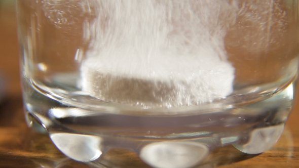 Effervescent Tablet Falling In Water