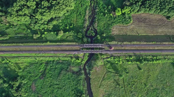 Aerial View of Railway Bridge Across the River in the Early Morning