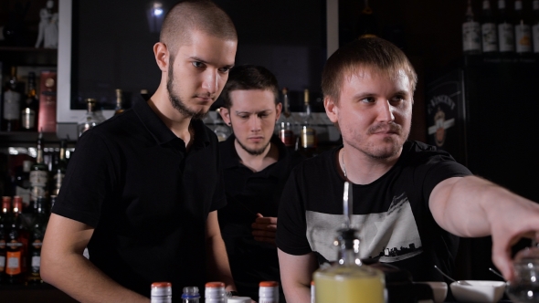 Professional Bartenders Work At a Party At a Nightclub