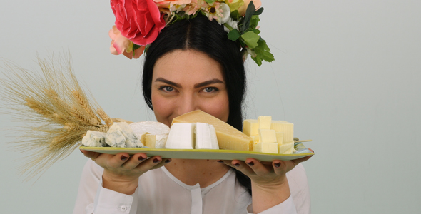 Woman Hiding Behind A Cheese Platter