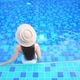 Young asian woman enjoy around outdoor swimming pool for leisure - VideoHive Item for Sale