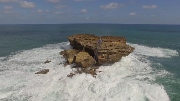 Aerial view cable car connecting isolate rock formation, Jogjakarta, Indonesia