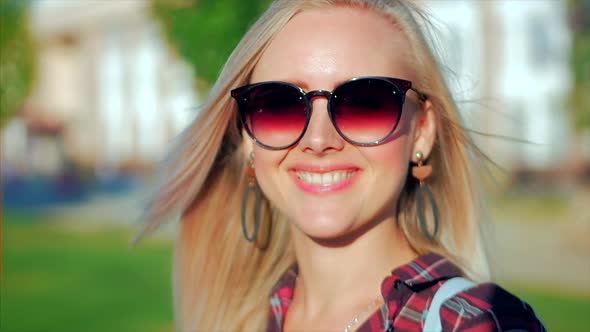 Portrait of European Cute Blonde in with Sunglass Young Happy Woman or Cheerful Girl Looking in The