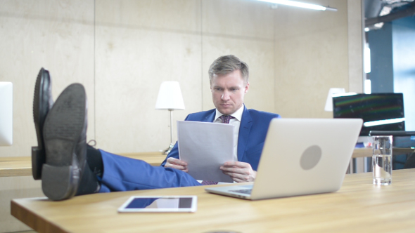 Relax Businessman Working in Office