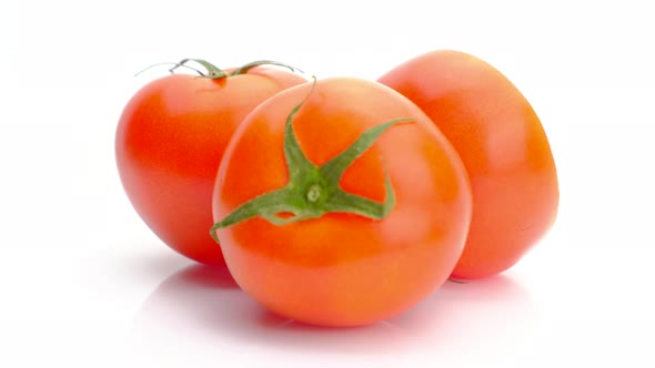 Tomatoes rotation and half tomato rotation isolated on white background, Close up