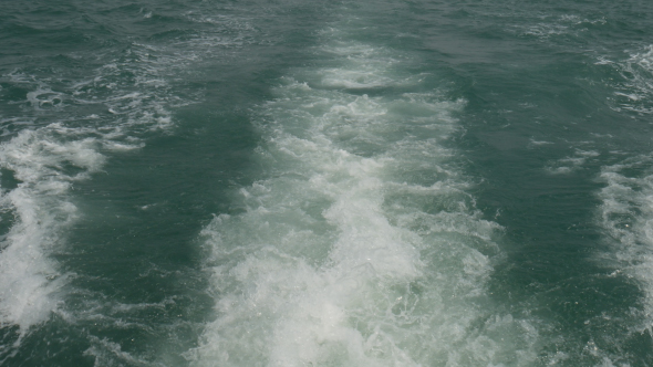 Sea Water Trails Behind Boat 