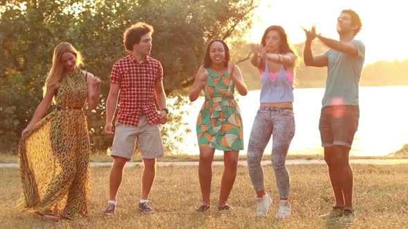 Five Friends Dancing At Sunset 2