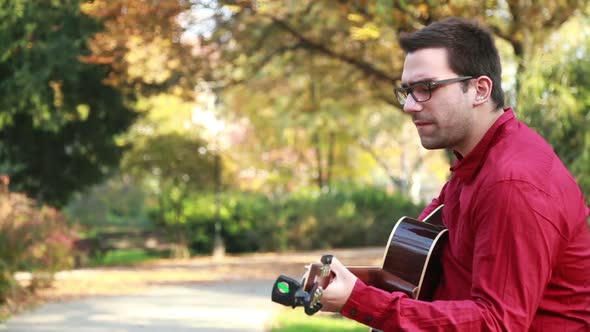 Man Playing The Guitar And Singing 2