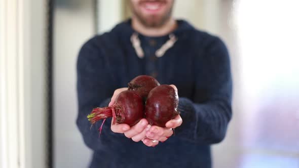 View Of Man Hands Holding Beetroots 1