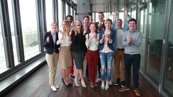 Portrait Of Happy Business And Advertising Team Laughing And Clapping 1