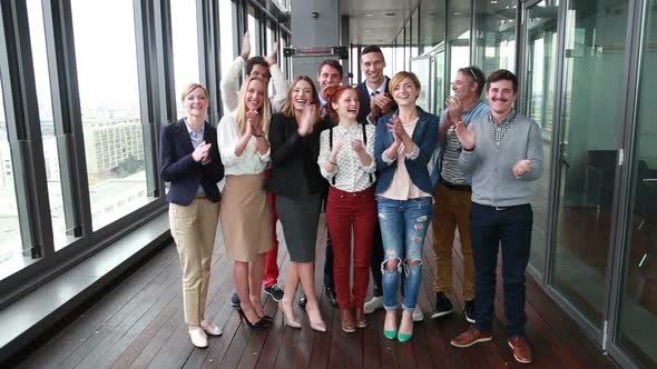 Portrait Of Happy Business And Advertising Team Laughing And Clapping 2