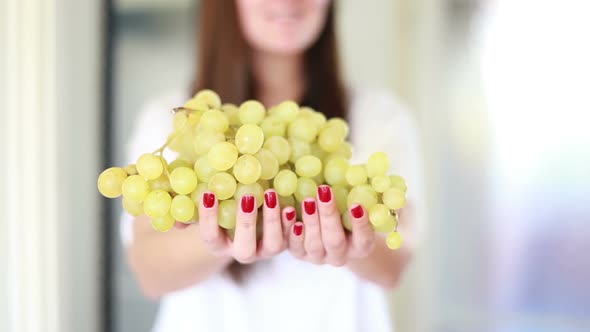 View Of Woman Hands Holding Bunch Of Grapes 2