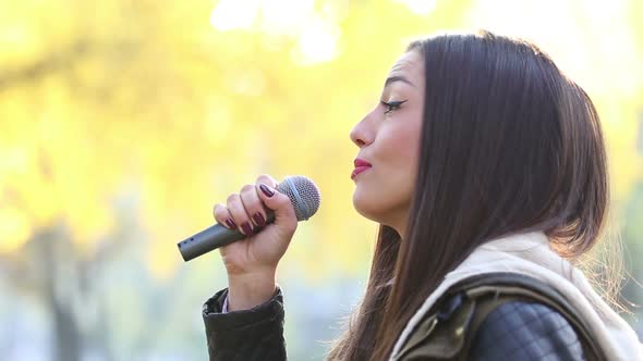 Profile Of Beautiful Woman Singing 1