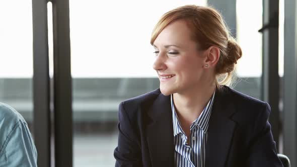 Beautiful Businesswoman Smiling During Meeting In Conference Room