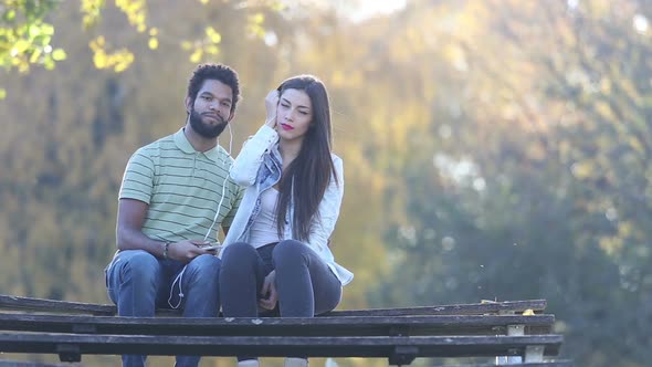 Couple Listening To Music Together, Sharing Earphones 7