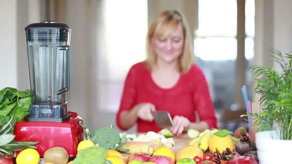 Woman Cutting Apple For Smoothie 1