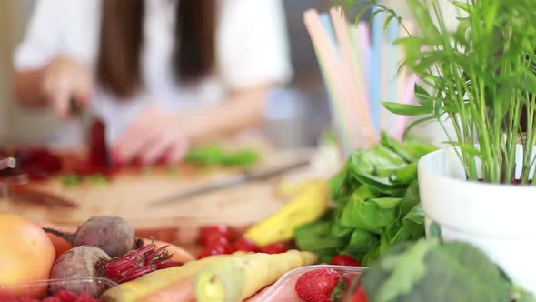 Woman Cutting Beetroot With Knife 3