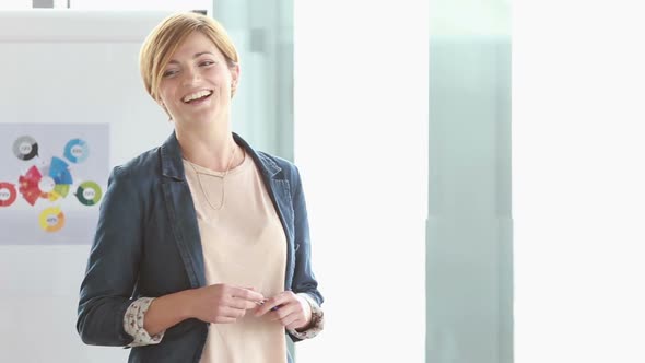 Smiling Businesswoman Giving Presentation 1