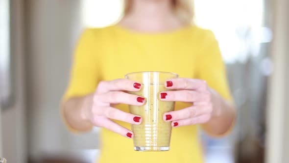 Woman Hands Holding Glass Of Smoothie