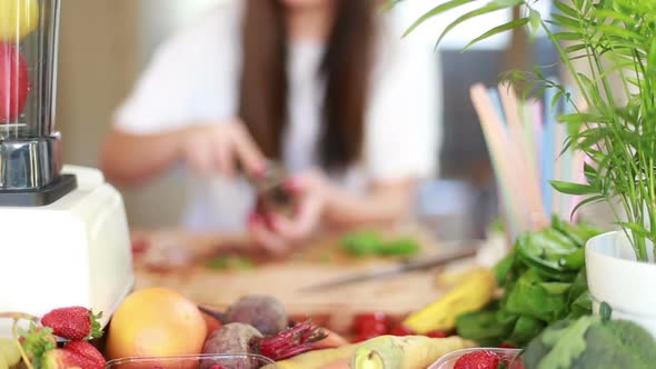 Woman Peeling Beetroot With Peeler