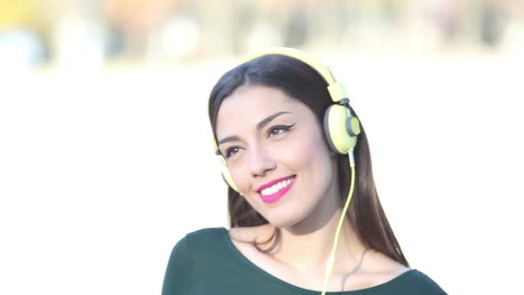 Beautiful Woman With Headphones Listening To Music 2