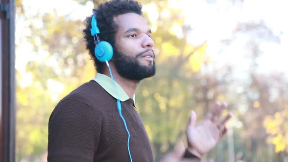 Man Listening To Music With Headphones