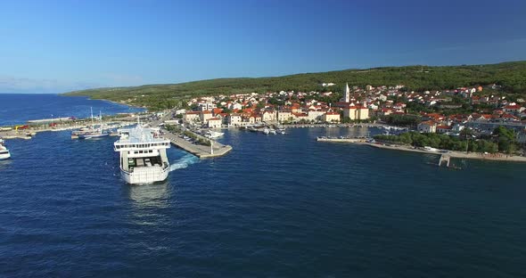 Aerial View Of Ferry Leaving Port In Supetar, Croatia 1 alt