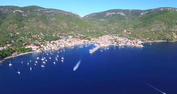 Aerial View Of Boat Leaving Harbour In Komiza, Croatia 1