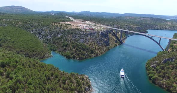 Aerial View Of Boat Sailing Towards Krka Bridge, Croatia 5