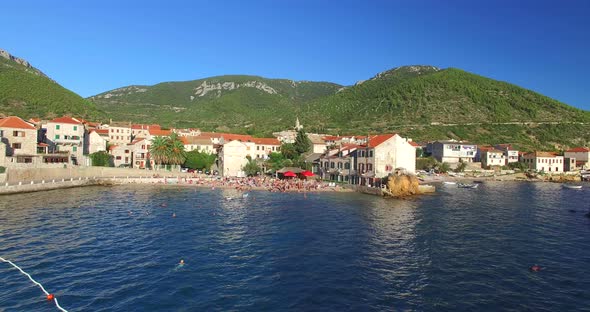 Aerial View Of Tourists On Beach At Komiza, Croatia