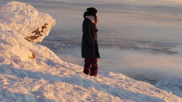 Woman Walking On The Top Of Are, Sweden Mountain And Taking Photos