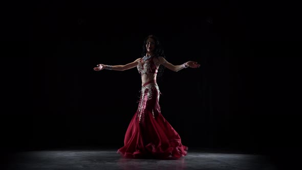 Oriental Belly Dancer. Black Background