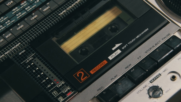 Insert Audio Cassettes Into The Tape Player And Pushing Play, Stop Buttons