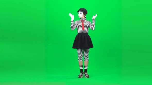Mime Is Playing with Her Hands