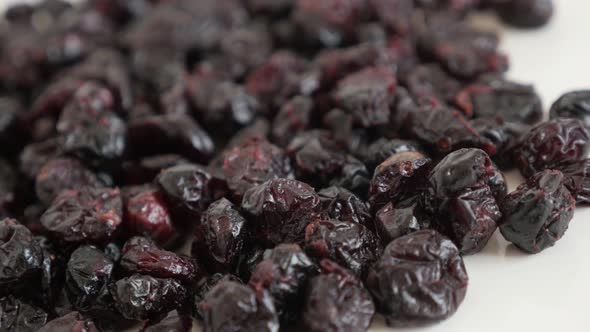 Dehydrated cranberries  close-up slow pan 4K 2160p 30fps UltraHD footage - Tasty Vaccinium oxycoccos