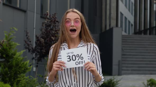 Smiling Girl Showing Up To 30 Percent Off Inscriptions Signs, Rejoicing Good Discounts, Low Prices